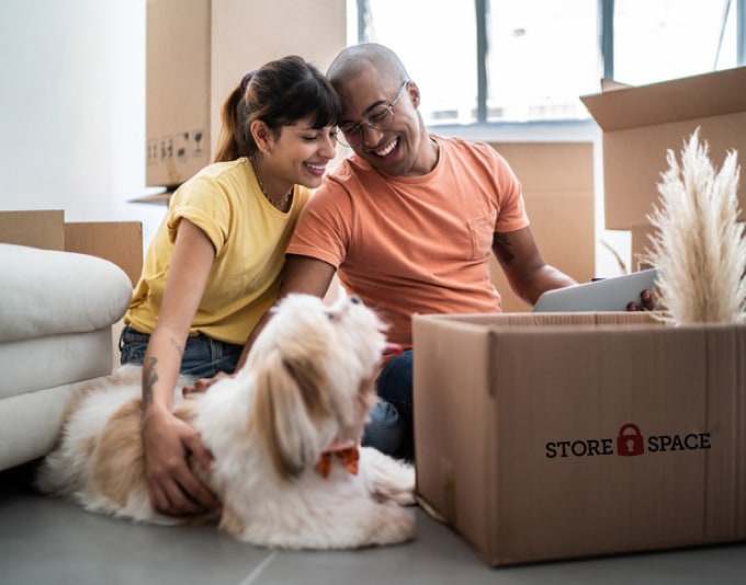 self-storage-page-header Couple packing for storage